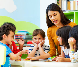 woman assisting kids