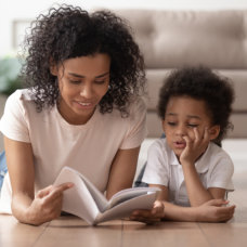 woman assisting kid