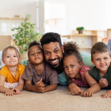 man with kids smiling