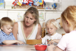 woman assisting kid