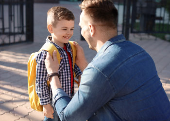 man and kid talking